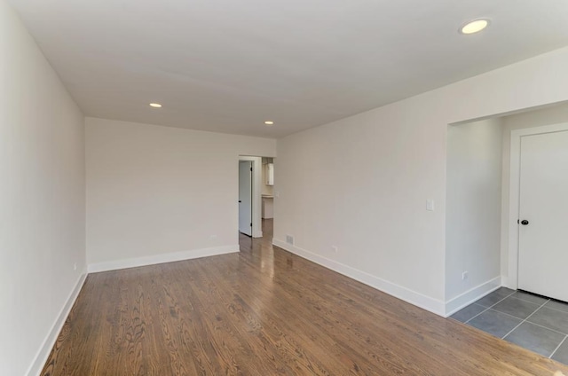 8916 S Sacramento Ave, Evergreen Park, IL 60805 - spare room with recessed lighting and dark wood-type flooring