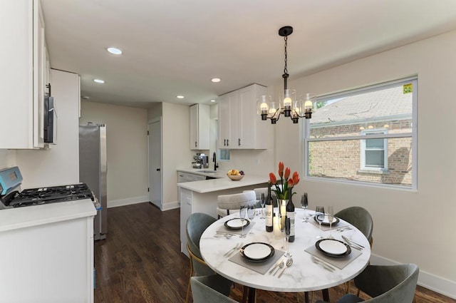 8916 S Sacramento Ave, Evergreen Park, IL 60805 - dining room featuring a chandelier, dark wood-style flooring, and recessed lighting