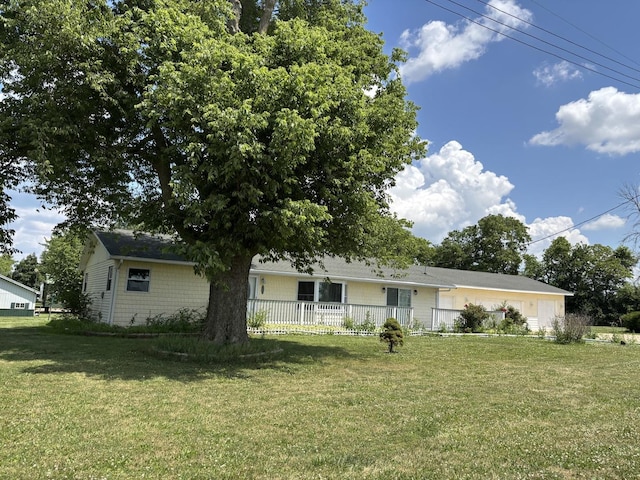 3667 Arthesia St E, Armstrong, IL 61812 - view of front facade with a front yard and a garage