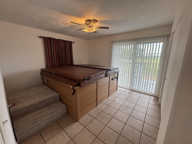 3667 Arthesia St E, Armstrong, IL 61812 - playroom with light tile patterned floors and a ceiling fan