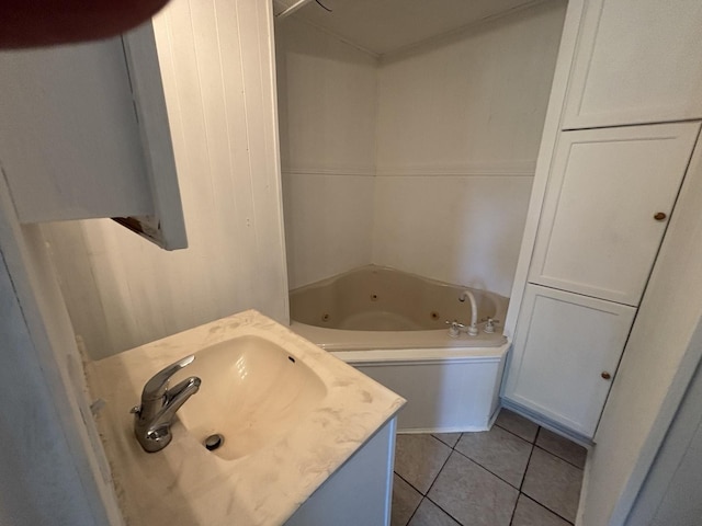 3667 Arthesia St E, Armstrong, IL 61812 - bathroom featuring a tub with jets, tile patterned floors, and vanity