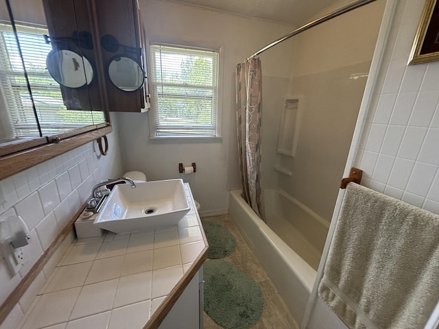 3667 Arthesia St E, Armstrong, IL 61812 - bathroom with shower / bath combo with shower curtain, tasteful backsplash, and tile walls