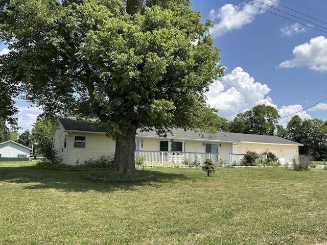 3667 Arthesia St E, Armstrong, IL 61812 - view of front facade featuring a front yard and an attached garage