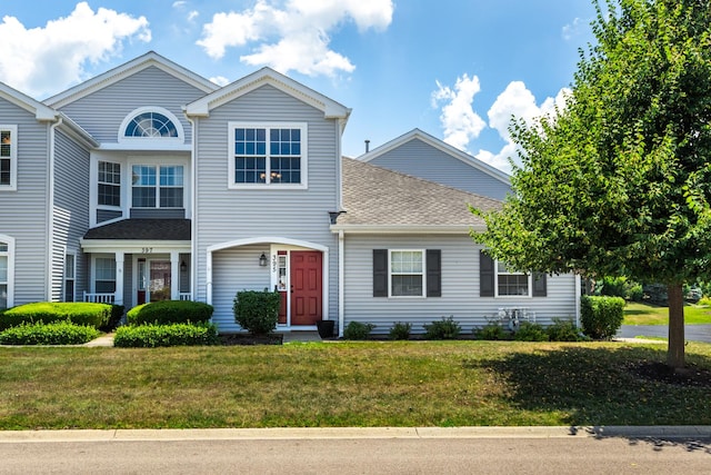 395 Cascade Ln Unit 0, Oswego, IL 60543 - view of front of home with a front lawn and roof with shingles
