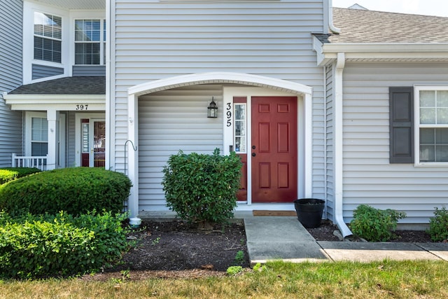 395 Cascade Ln Unit 0, Oswego, IL 60543 - doorway to property with roof with shingles