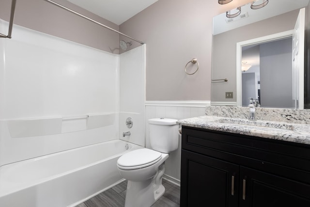 395 Cascade Ln Unit 0, Oswego, IL 60543 - full bathroom with vanity, a wainscoted wall, washtub / shower combination, and wood finished floors