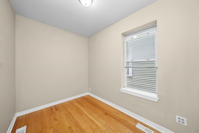 1438 S 50th Ct, Cicero, IL 60804 - empty room featuring baseboards and light wood finished floors