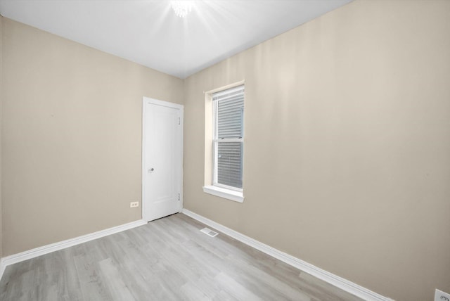 1438 S 50th Ct, Cicero, IL 60804 - empty room featuring light wood-style flooring and baseboards