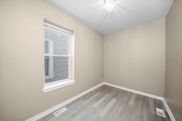 1438 S 50th Ct, Cicero, IL 60804 - unfurnished room featuring wood finished floors and baseboards