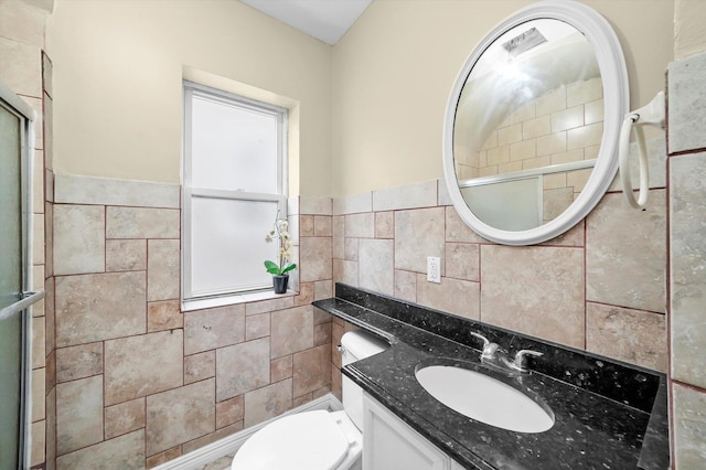 1438 S 50th Ct, Cicero, IL 60804 - full bathroom with tile walls, vanity, a shower with door, and a wainscoted wall