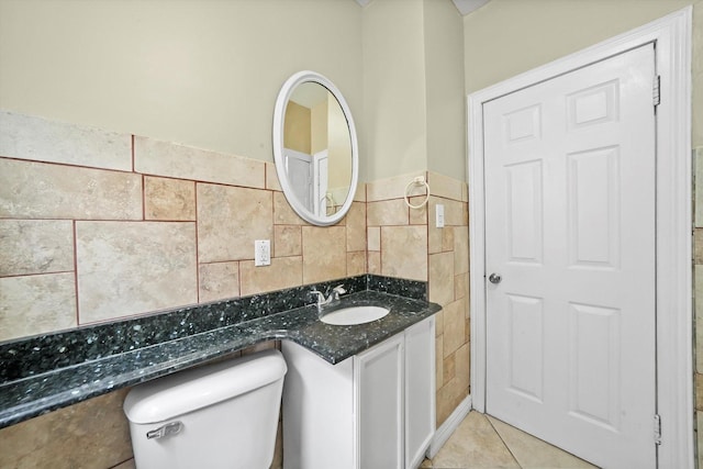 1438 S 50th Ct, Cicero, IL 60804 - bathroom featuring vanity, tile walls, tile patterned flooring, and a wainscoted wall