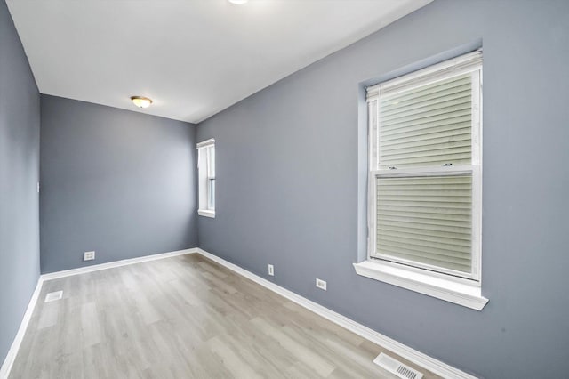 1438 S 50th Ct, Cicero, IL 60804 - unfurnished room featuring wood finished floors and baseboards