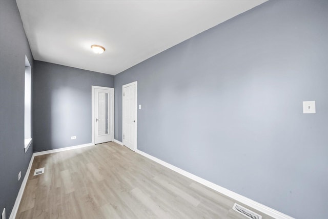 1438 S 50th Ct, Cicero, IL 60804 - empty room featuring wood finished floors and baseboards