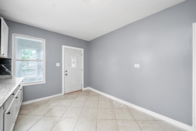 1438 S 50th Ct, Cicero, IL 60804 - interior space with baseboards and light tile patterned floors