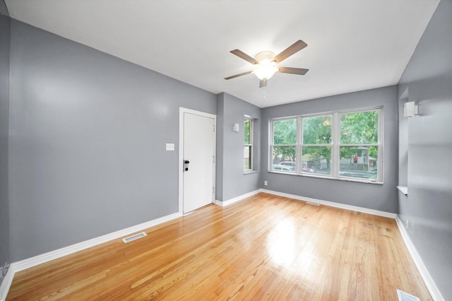 1438 S 50th Ct, Cicero, IL 60804 - unfurnished room featuring hardwood / wood-style floors and a ceiling fan
