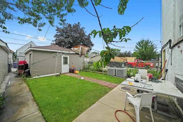 1438 S 50th Ct, Cicero, IL 60804 - view of yard featuring a patio and an outbuilding