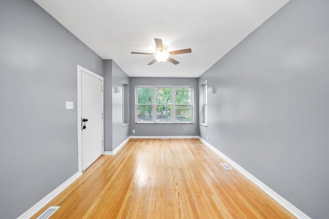 1438 S 50th Ct, Cicero, IL 60804 - empty room with ceiling fan and hardwood / wood-style floors