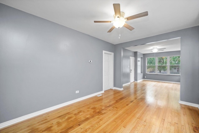 1438 S 50th Ct, Cicero, IL 60804 - spare room featuring a ceiling fan and light wood-style flooring
