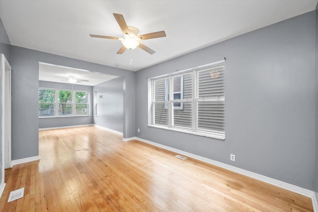 1438 S 50th Ct, Cicero, IL 60804 - empty room with ceiling fan and wood-type flooring