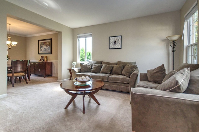 8307 Newbridge Ct, Joliet, IL 60431 - living room with a chandelier, carpet, and ornamental molding