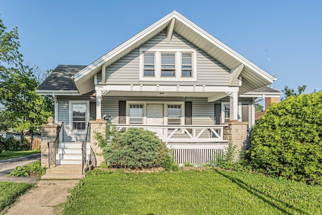 193 May St, Bensenville, IL 60106 - view of front of property with a porch and a front lawn