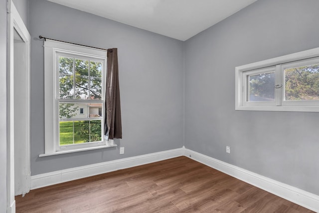 193 May St, Bensenville, IL 60106 - unfurnished room with wood finished floors and baseboards