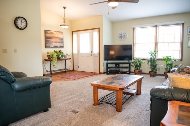 2107 10th Ave, Sterling, IL 61081 - carpeted living area featuring ceiling fan and baseboards