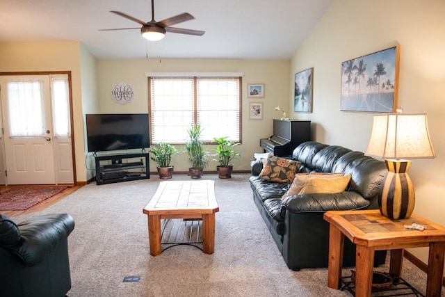 2107 10th Ave, Sterling, IL 61081 - carpeted living room featuring vaulted ceiling and ceiling fan