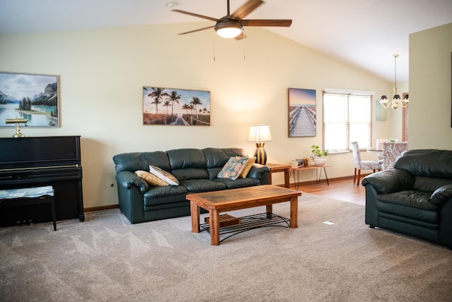2107 10th Ave, Sterling, IL 61081 - living area featuring vaulted ceiling, ceiling fan, a chandelier, and carpet flooring