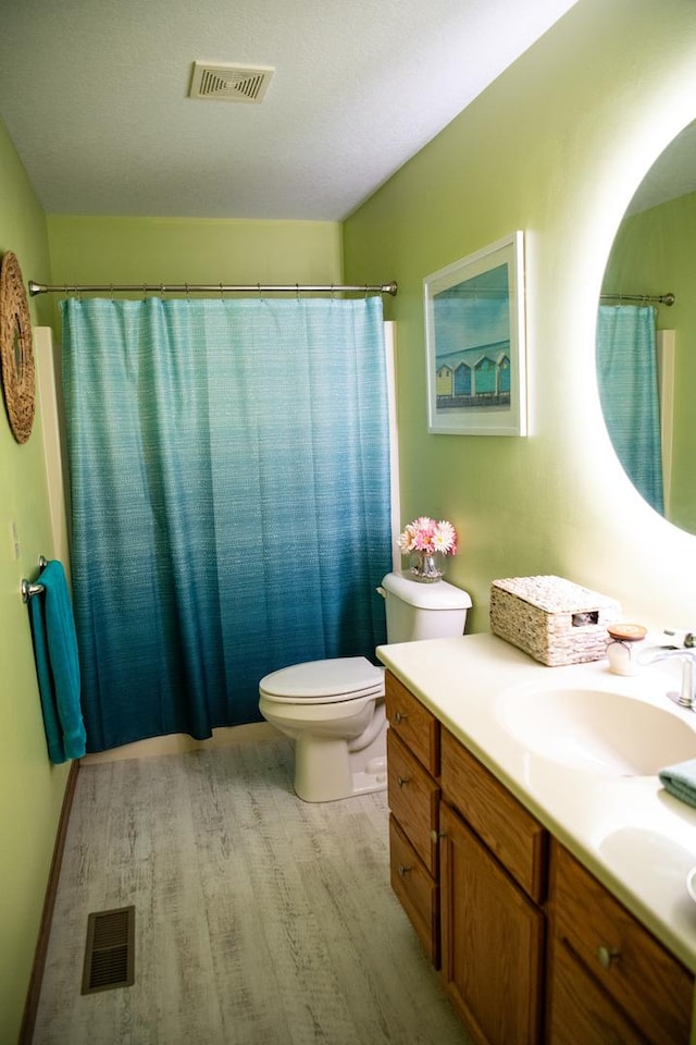 2107 10th Ave, Sterling, IL 61081 - bathroom with wood finished floors and vanity