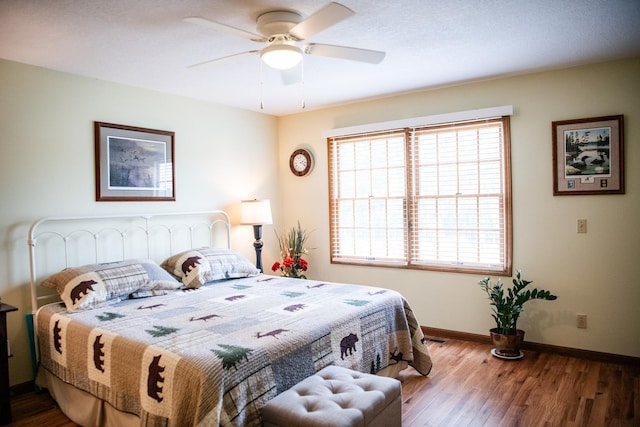 2107 10th Ave, Sterling, IL 61081 - bedroom with wood finished floors and a ceiling fan