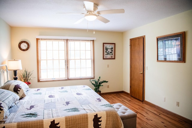 2107 10th Ave, Sterling, IL 61081 - bedroom featuring wood finished floors and a ceiling fan