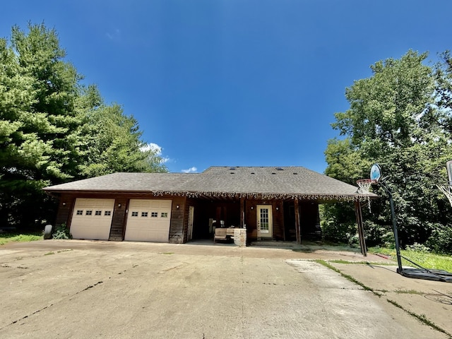 827 N 2199th Rd, Tonica, IL 61370 - view of front of home featuring driveway, an attached garage, and a shingled roof