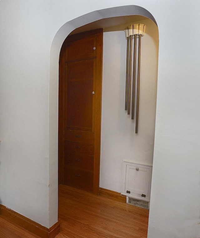 1411 E Hickory St, Streator, IL 61364 - corridor with arched walkways and wood finished floors