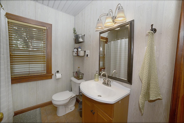 1411 E Hickory St, Streator, IL 61364 - full bath featuring tile patterned flooring, vanity, and wood walls