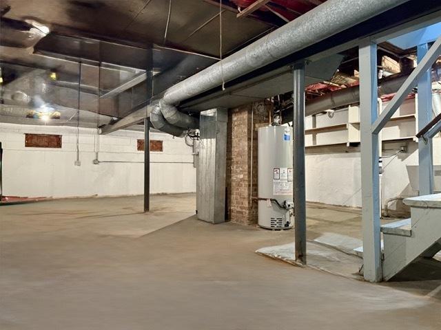 505 W Alexander Blvd, Elmhurst, IL 60126 - unfinished basement featuring gas water heater and stairway