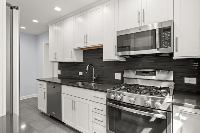 505 W Alexander Blvd, Elmhurst, IL 60126 - kitchen featuring stainless steel appliances, light tile patterned flooring, white cabinetry, backsplash, and recessed lighting