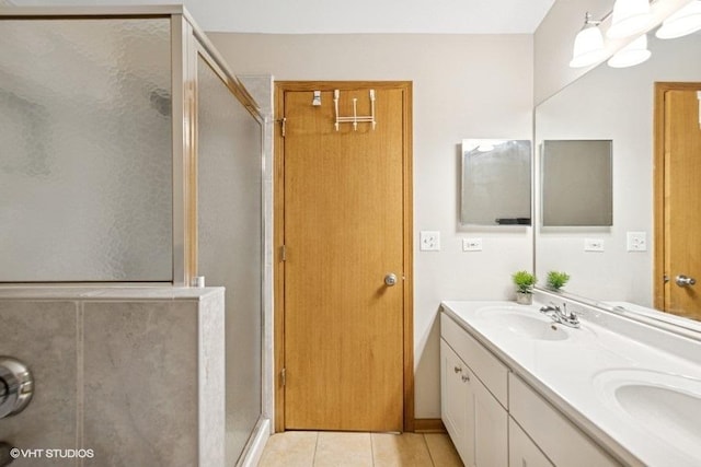 711 Creekside Cir Unit 711, Gurnee, IL 60031 - bathroom with a shower stall, double vanity, and tile patterned flooring