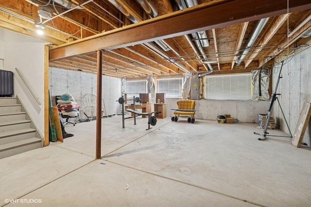 711 Creekside Cir Unit 711, Gurnee, IL 60031 - unfinished below grade area featuring electric panel and stairs