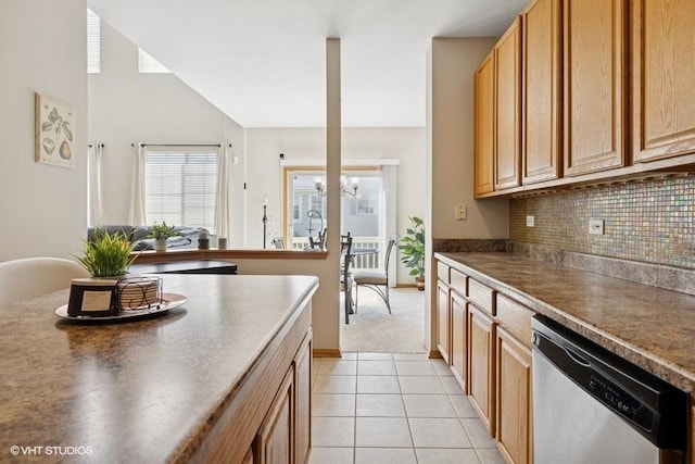 711 Creekside Cir Unit 711, Gurnee, IL 60031 - kitchen featuring dishwasher, tasteful backsplash, dark countertops, and light tile patterned floors