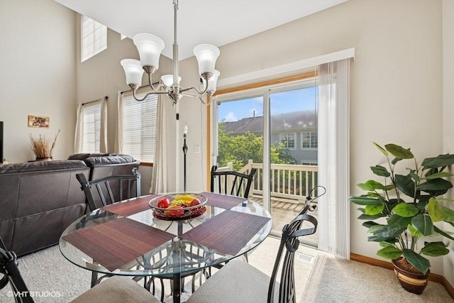 711 Creekside Cir Unit 711, Gurnee, IL 60031 - dining space featuring a chandelier and carpet flooring