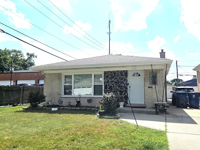678 Muskegon Ave, Calumet City, IL 60409 - ranch-style house featuring a chimney, brick siding, and driveway