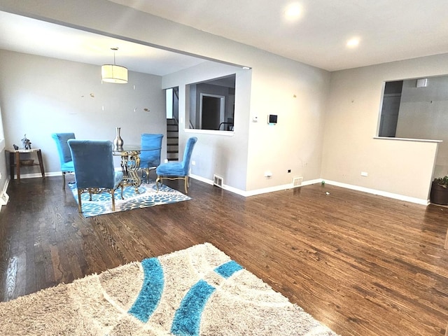 678 Muskegon Ave, Calumet City, IL 60409 - dining area featuring baseboards and wood finished floors