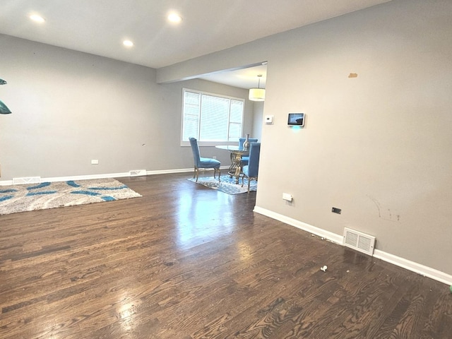 678 Muskegon Ave, Calumet City, IL 60409 - unfurnished room featuring wood finished floors and recessed lighting