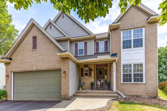 330 Greenview Ln, Lake Villa, IL 60046 - traditional-style home with brick siding and driveway