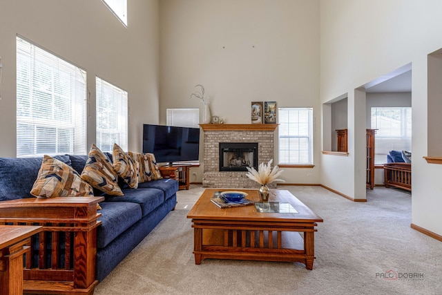 330 Greenview Ln, Lake Villa, IL 60046 - living room featuring a towering ceiling, carpet flooring, and a fireplace