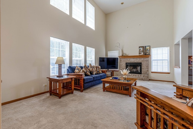 330 Greenview Ln, Lake Villa, IL 60046 - carpeted living room featuring a high ceiling and a fireplace