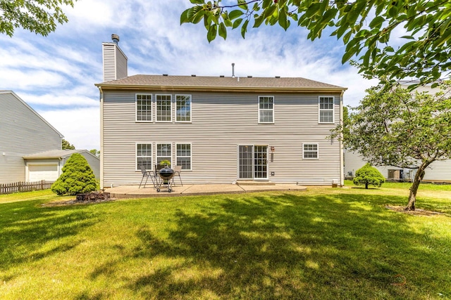 330 Greenview Ln, Lake Villa, IL 60046 - rear view of house featuring a chimney and a patio area