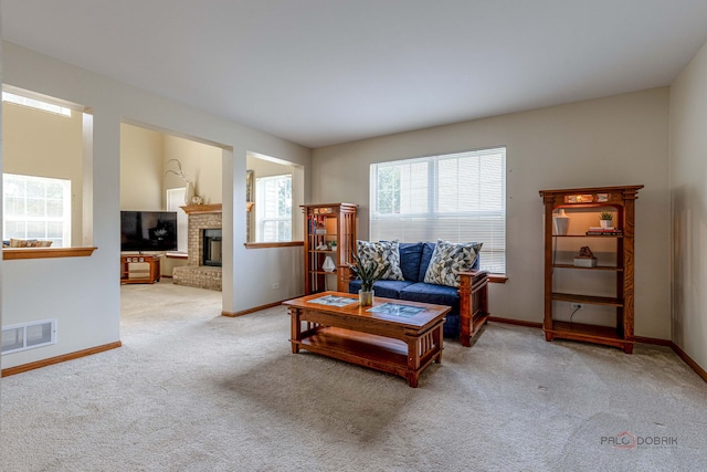 330 Greenview Ln, Lake Villa, IL 60046 - carpeted living area with baseboards and a brick fireplace