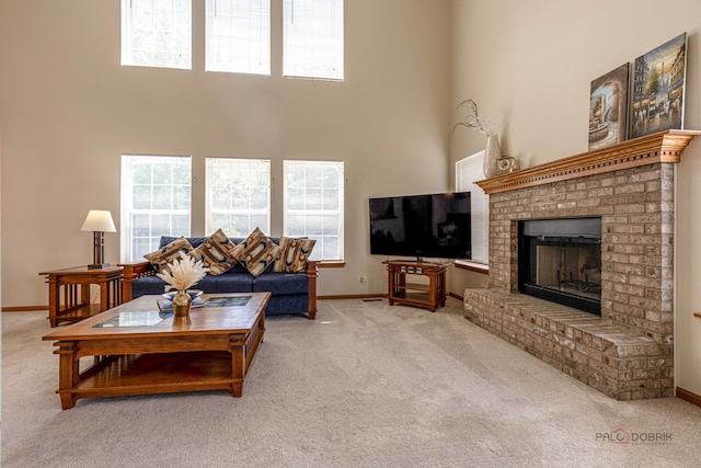 330 Greenview Ln, Lake Villa, IL 60046 - carpeted living room featuring a brick fireplace and a high ceiling